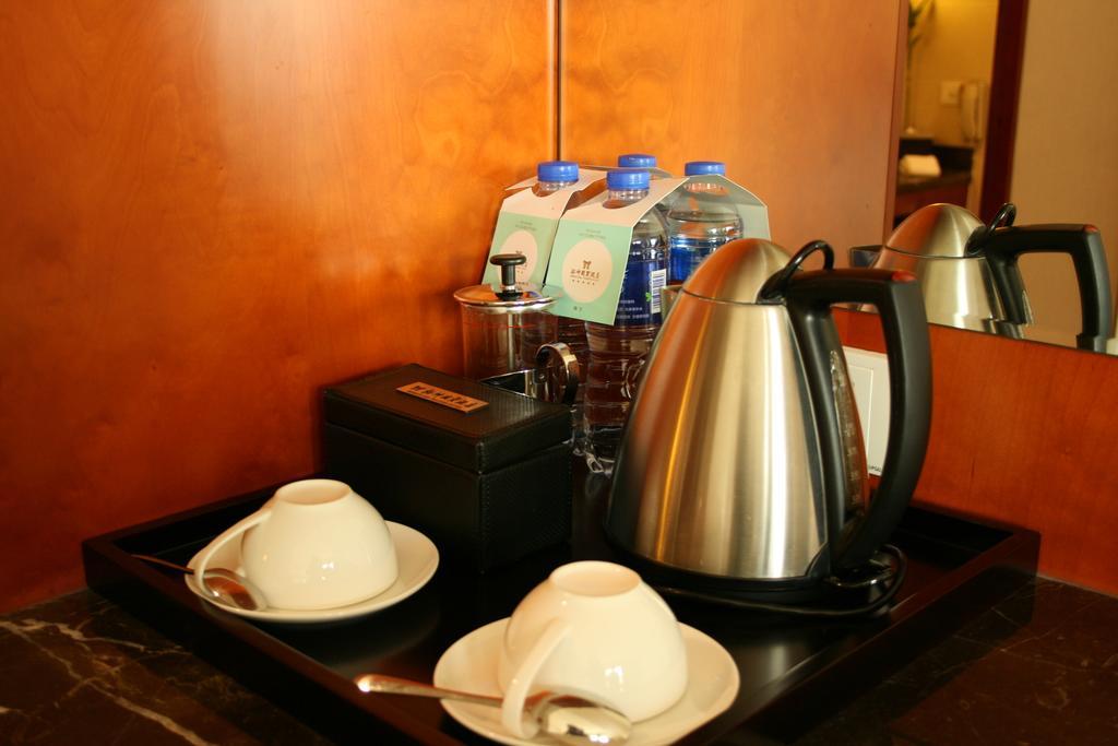 Merryland Traders Hotel Changshu Rom bilde