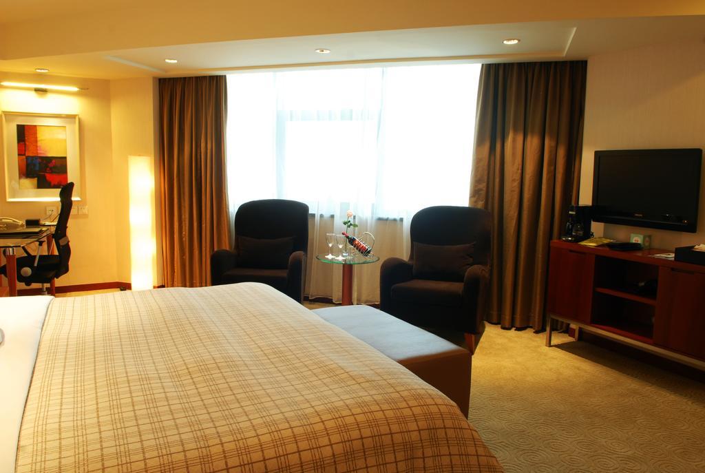 Merryland Traders Hotel Changshu Rom bilde