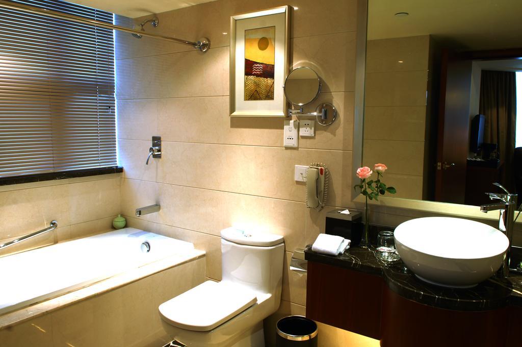 Merryland Traders Hotel Changshu Rom bilde